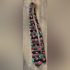 Men’s football tie with footballs and football helmets